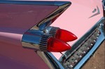 Rear wings of pink Cadillac